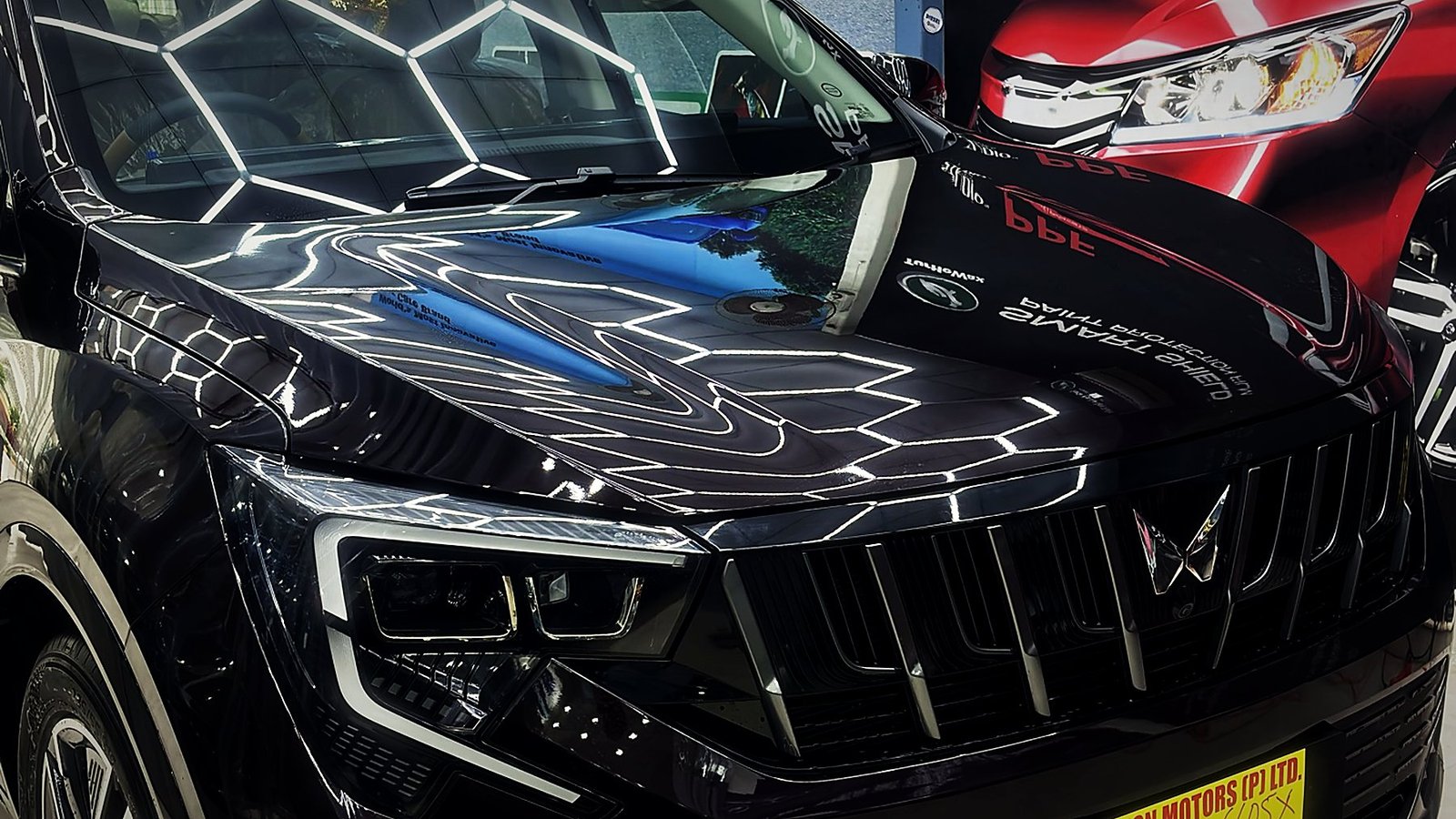 XUV700 with the hex ceiling mirrored in the bonnet